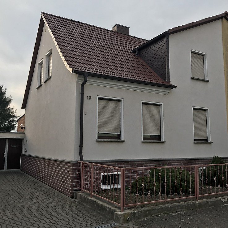 Foto Familiengl�ck mit gro�em Grundst�ck